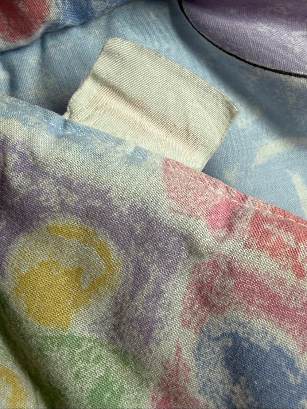 Fisher-Price Multicolor Polka Dot Fabric with Red Logo Tag